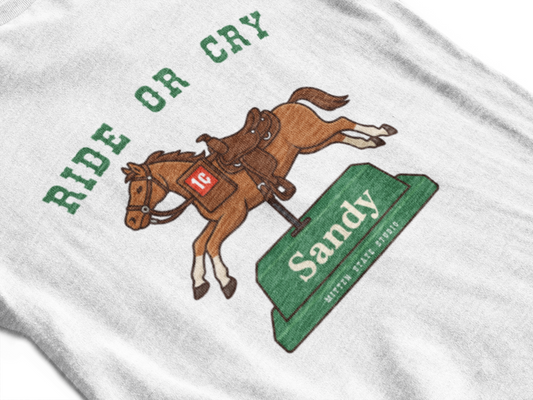 Ride or Cry – Sandy the Meijer Penny Horse Novelty Unisex Tee